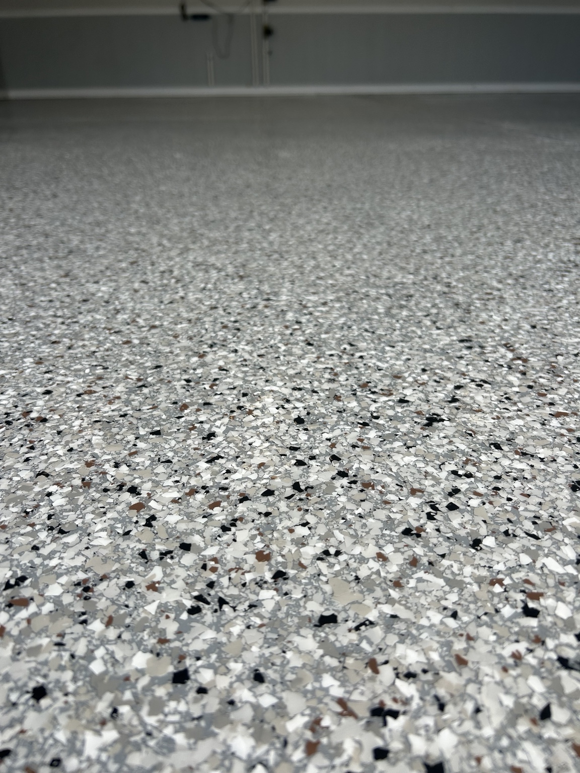 Close-up of Coyote flake floor finish